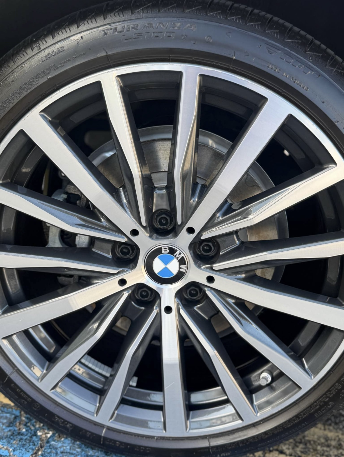 Clean BMW alloy wheel and dressed tire